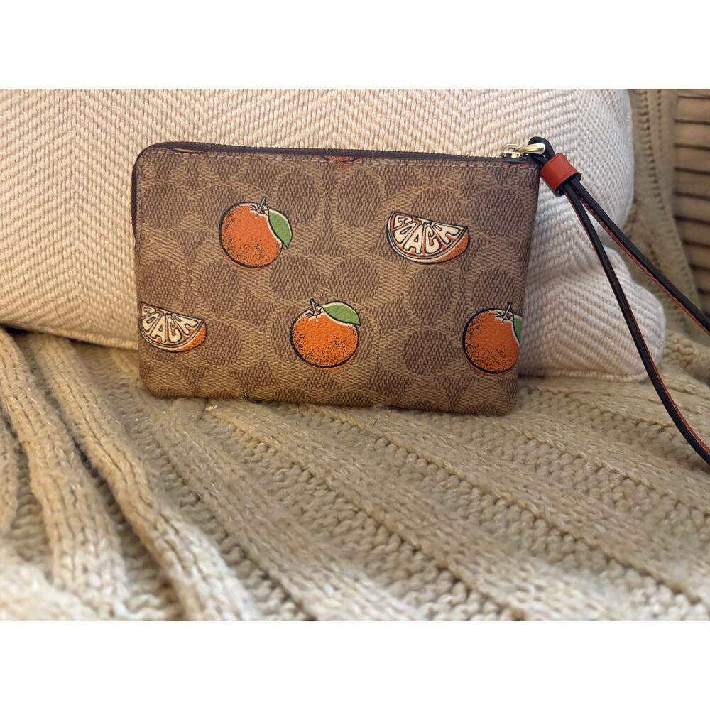 Coach Corner Zip Wristlet in Signature Canvas with Orange Print CBB82 - Picture 2 of 9